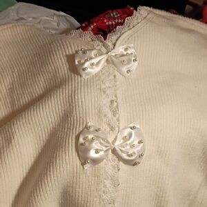 Cream Sweater with Bow Accents